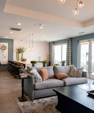 black-wooden-coffee-table-near-white-couch